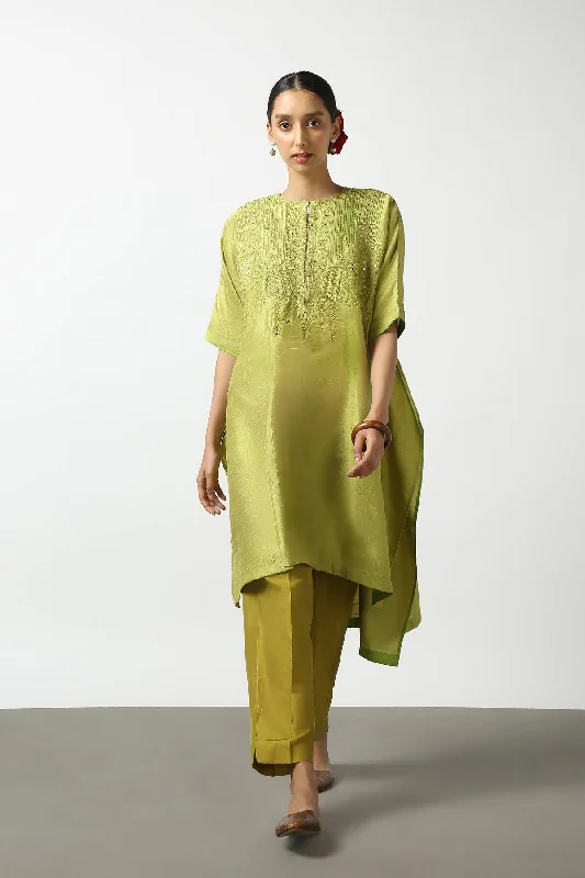 Green Raw Silk Top with Mirror Work Yoke. Tussar Pant or M. Giri Pant.